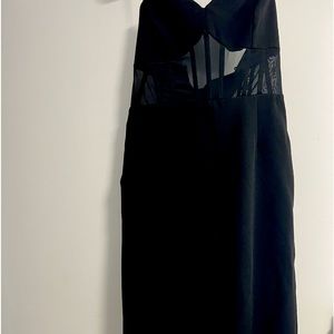 Black  strapless Jumpsuit(also comes with straps). Size medium